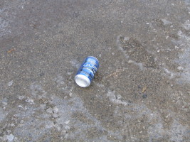 beer can in road