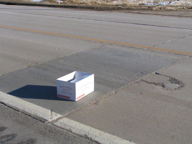 white box in road