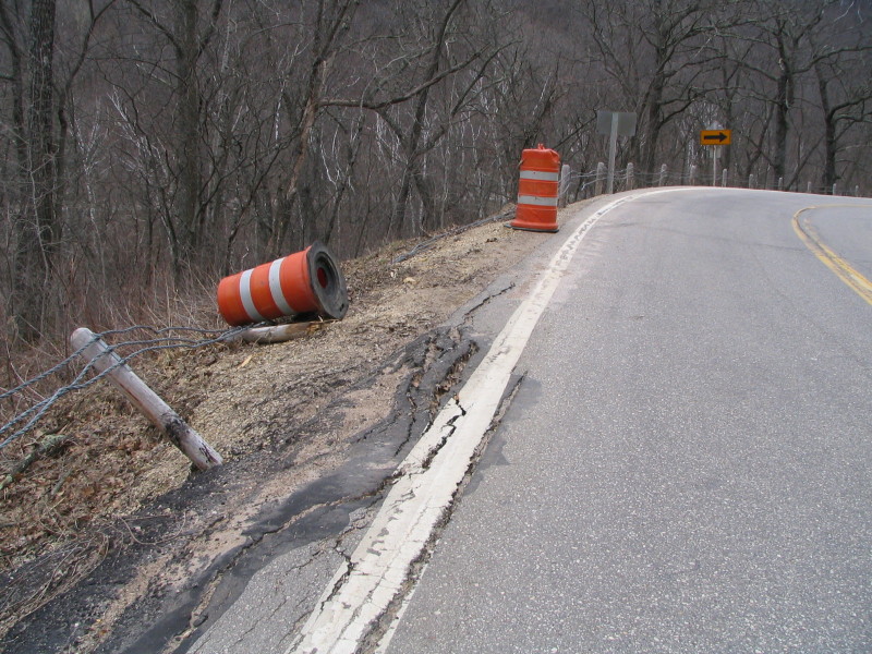 caution barrels in road