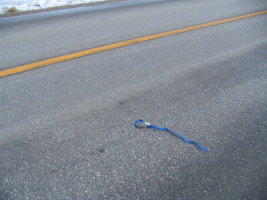 blue strap in road