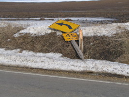 curve sign on road