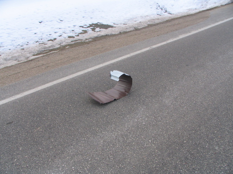 sheet metal in road